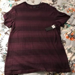 New Men’s purple large t-shirt.